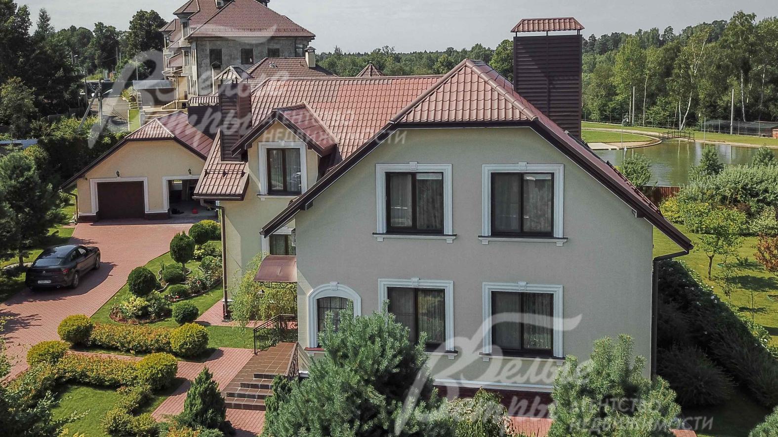 Дом с мебелью на участке площадью 25 соток в охраняемом коттеджном поселке Европейская долина