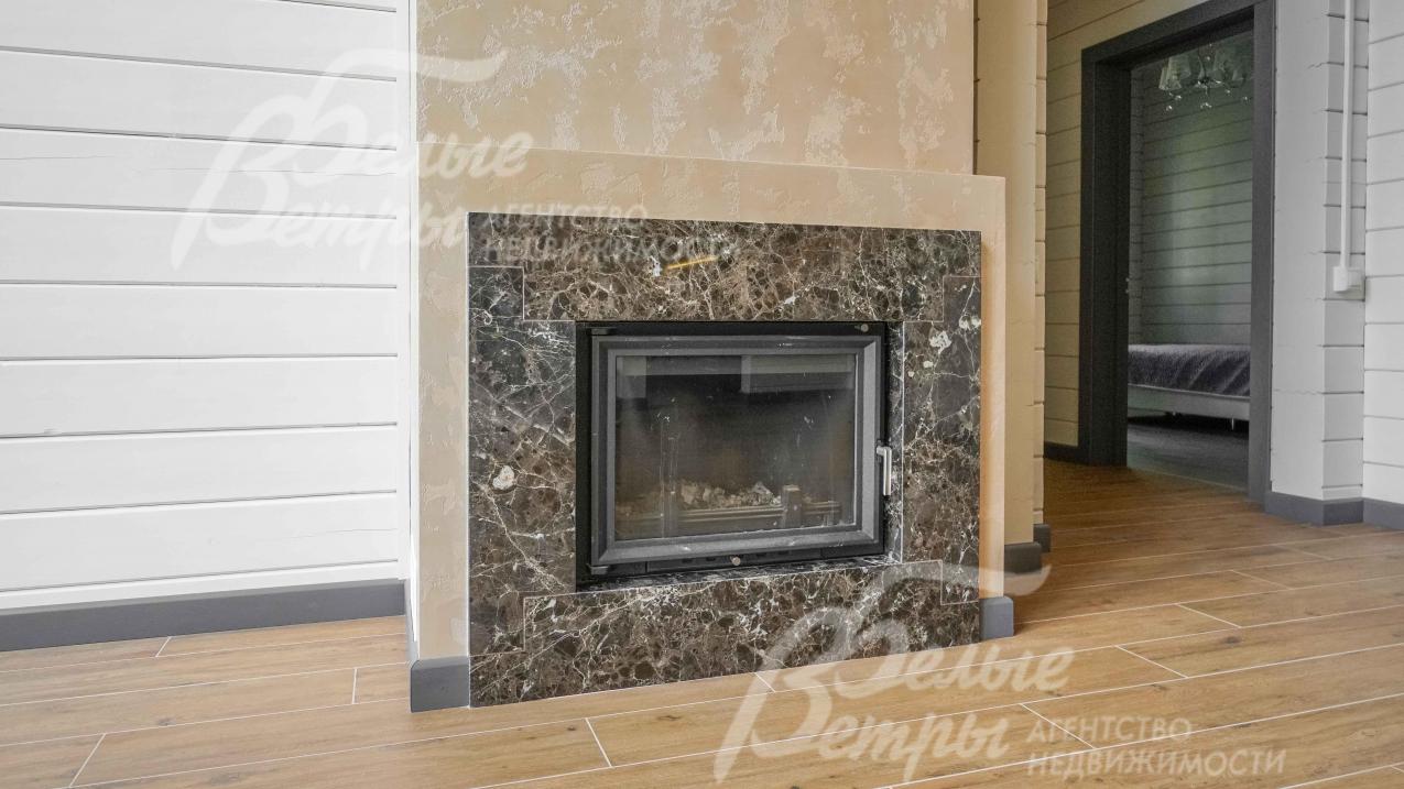 Камин облицован мрамором Имперадор