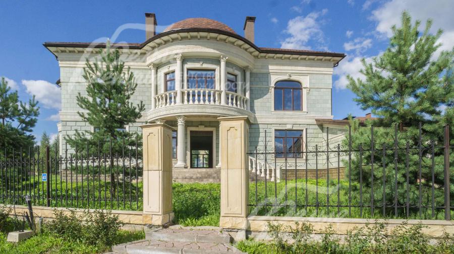 Отделка фасада искусственным камнем АрхиИзделия