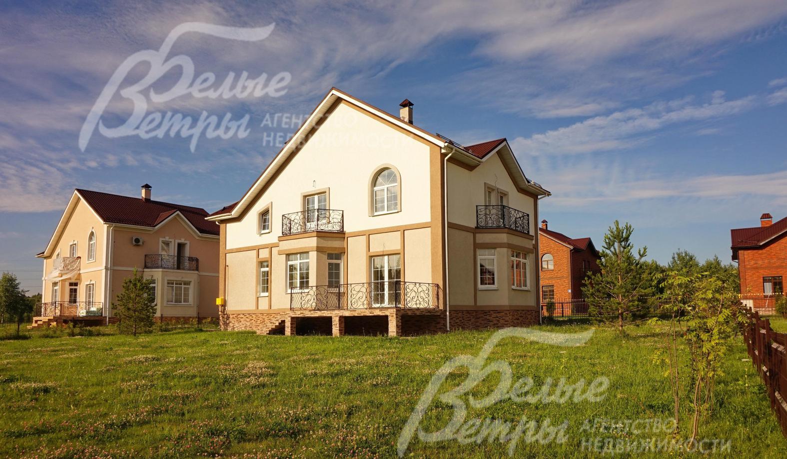 Вид на дом со стороны участка