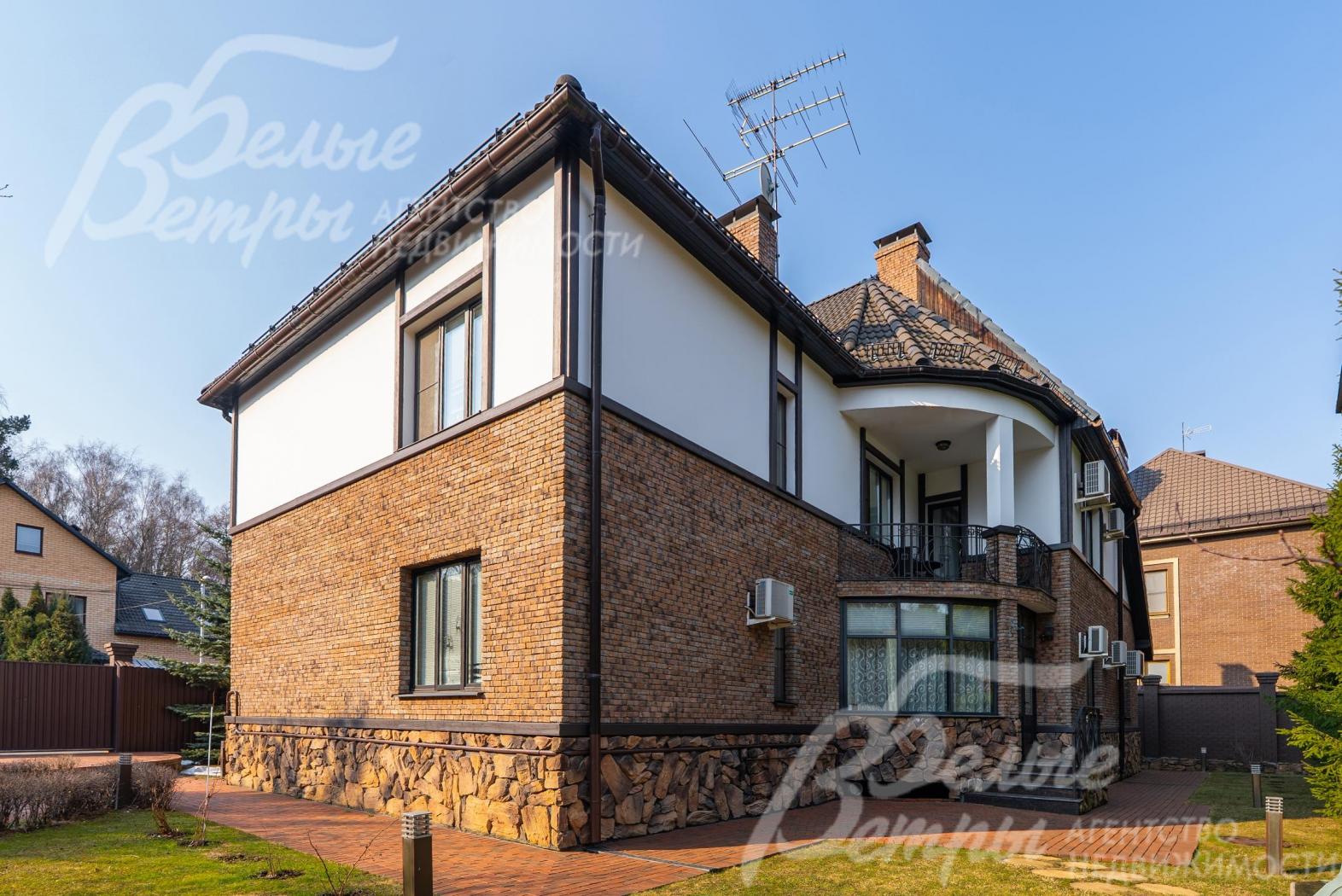 Кирпичный дом 500 кв.м на участке 15 соток с ландшафтом. 