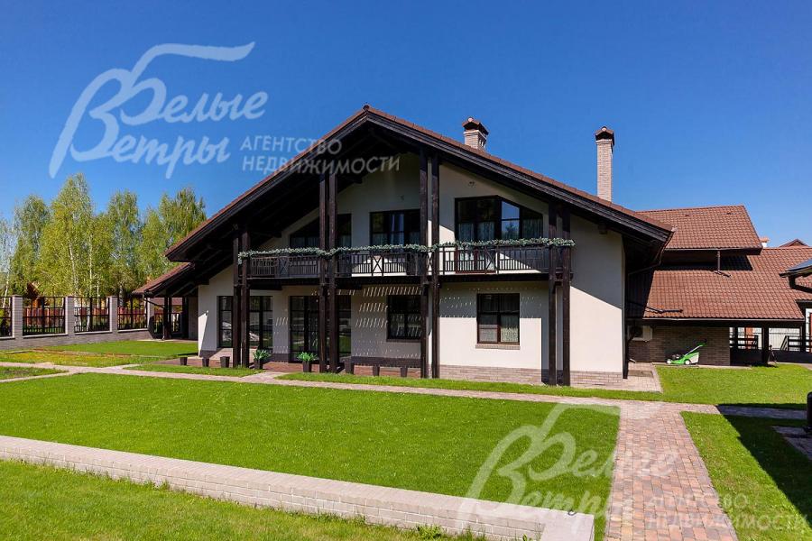 Кирпичный дом на участке площадью 20 соток в строгоохраняемом коттеджном поселке Афинеево