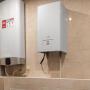 В котельной - одноконтурный электрическиё котёл нового поколения Protherm Скат RAY 9 KE/14 мощностью 9 кВт и водонагреватель Electrolux EWH 100 Roya