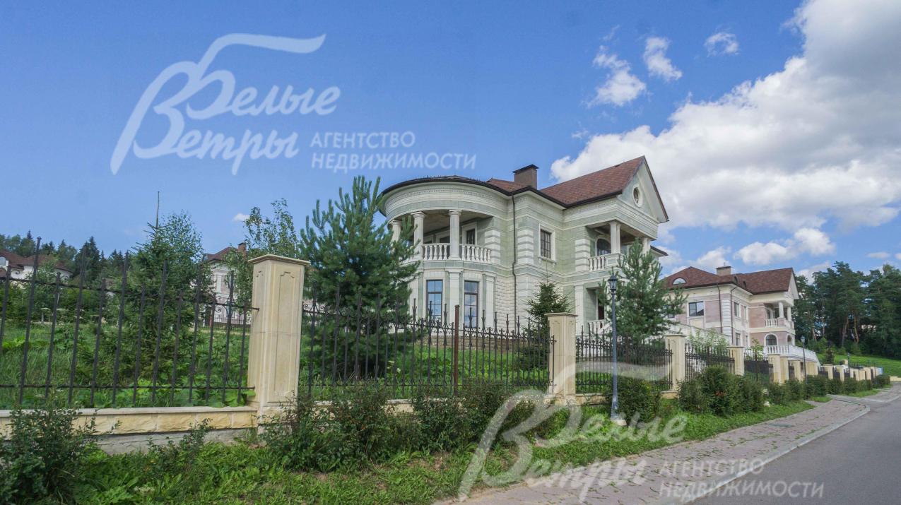 Кирпичный дом на участке 21 сотки в строгоохраняемом поселке Идиллия