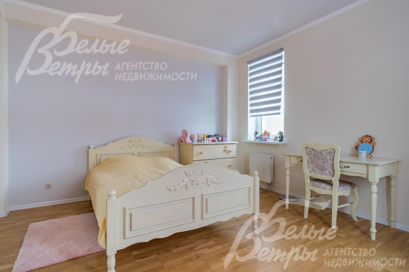 Одна из спален в коттедже