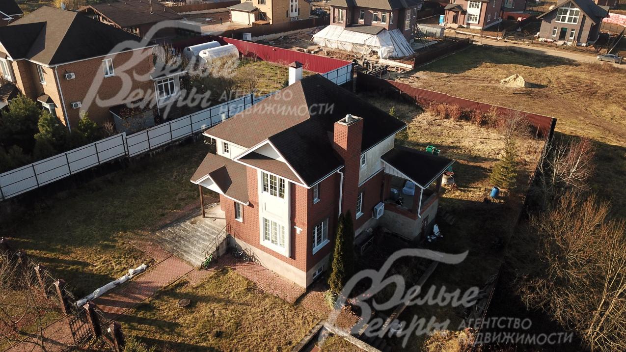 Деревянный коттедж под ключ на участке площадью 15 соток в строгоохраняемом коттеджном поселке Ильичевка